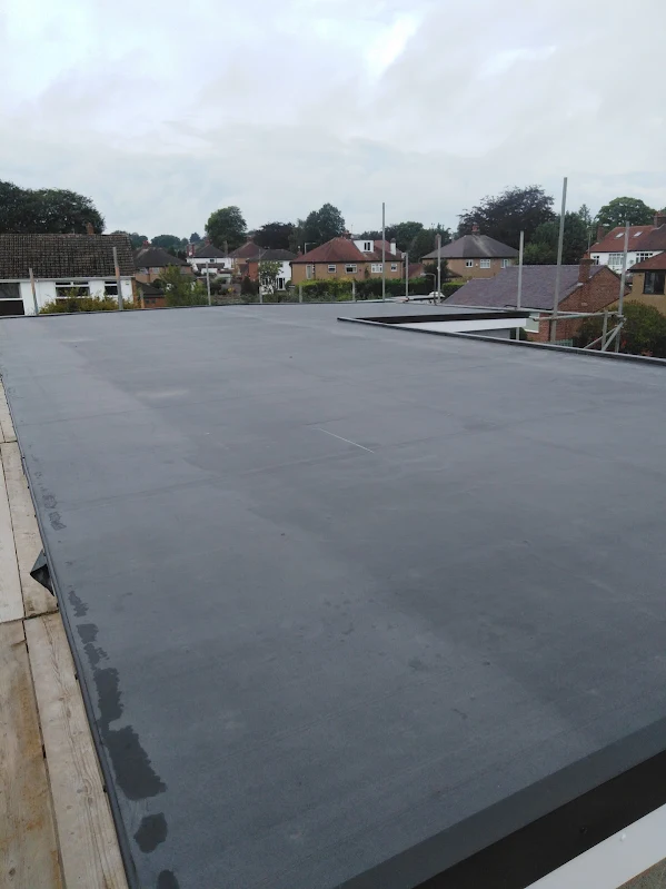 Modern Flat Roof Installation Seamless EPDM rubber & GRP flat roof installation in the Wirral. Completely watertight, insulated, and built to last.